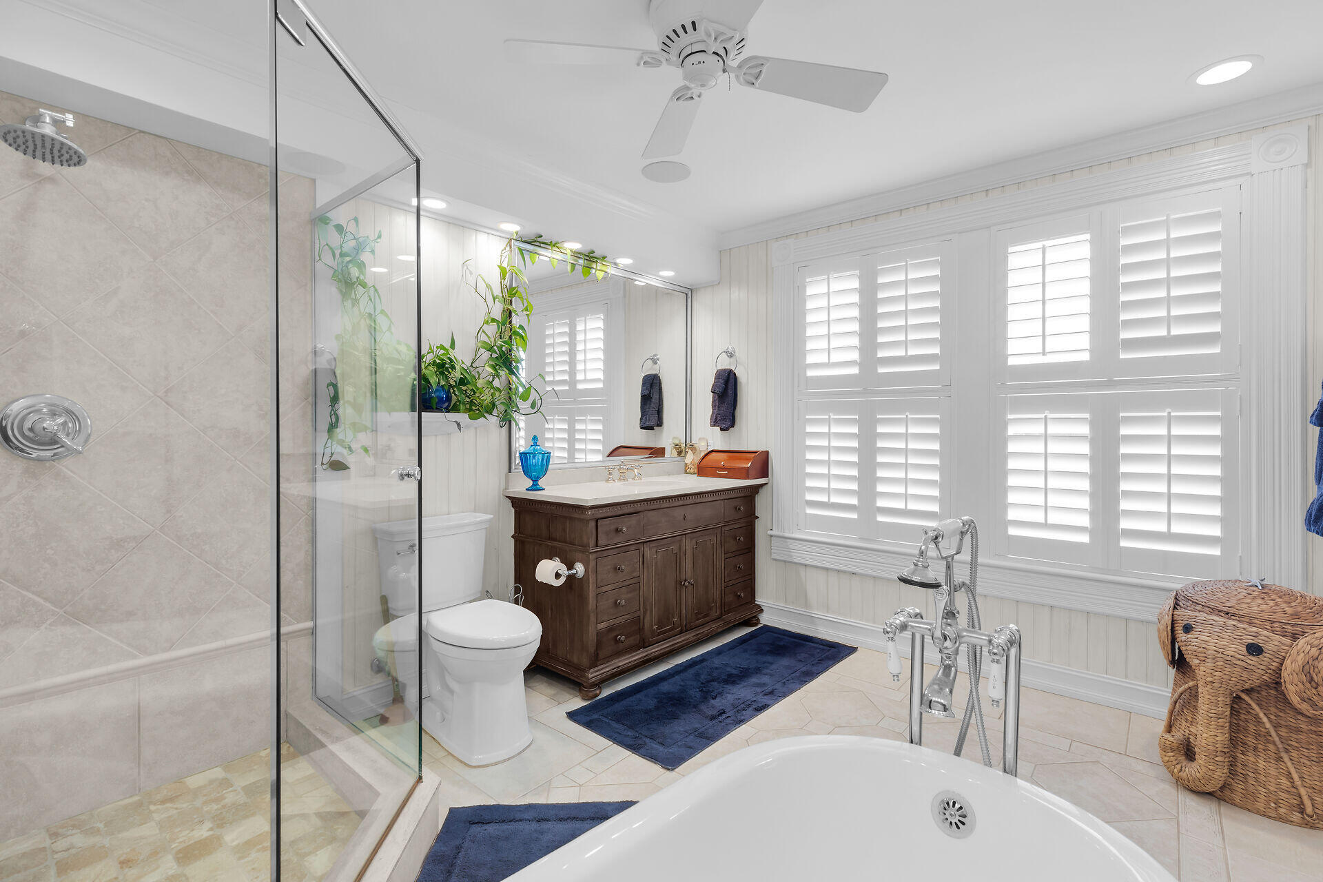 626 Grinnell Street Key West, FL 33040 - Photo 33 of 40 a bathroom with a sink a toilet a mirror and shower