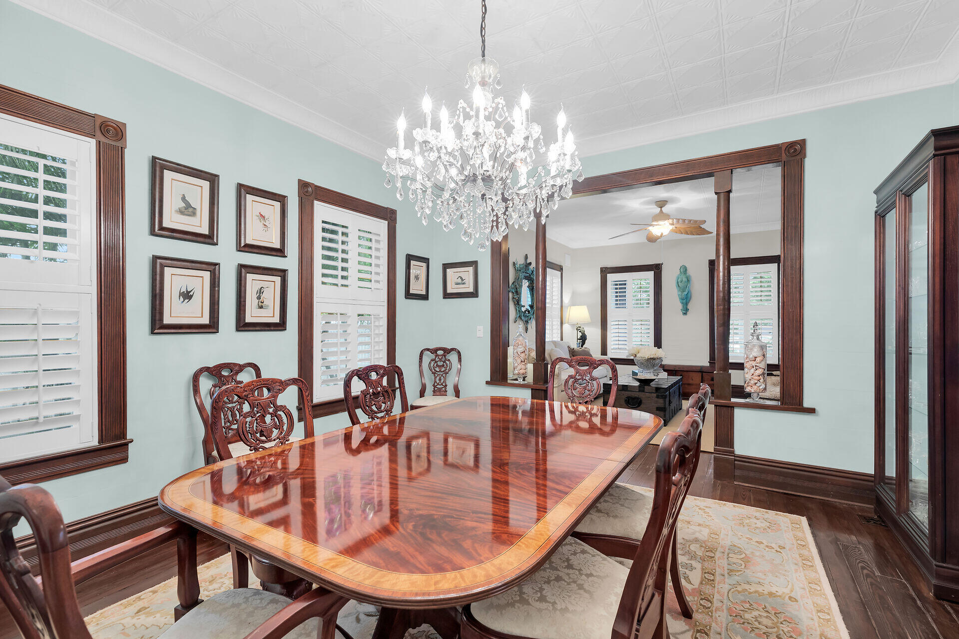 626 Grinnell Street Key West, FL 33040 - Photo 6 of 40 a dining room with furniture a chandelier and window