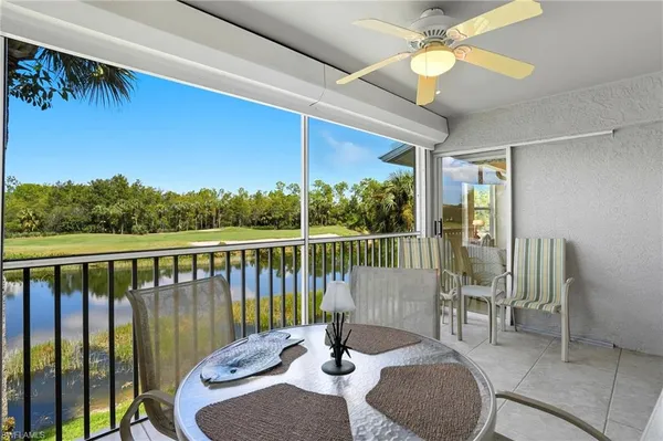 a view of a balcony and chairs
