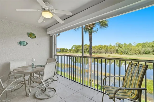 a view of a chairs and table in patio