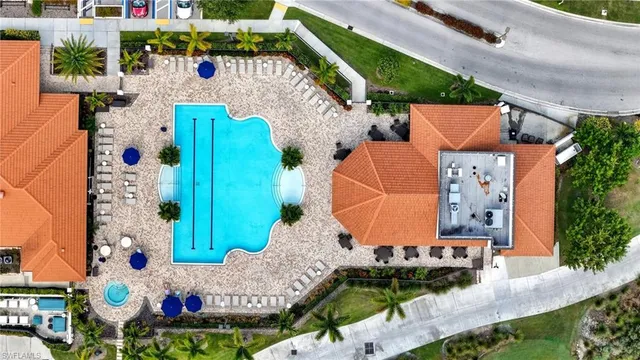 an aerial view of a house with outdoor space