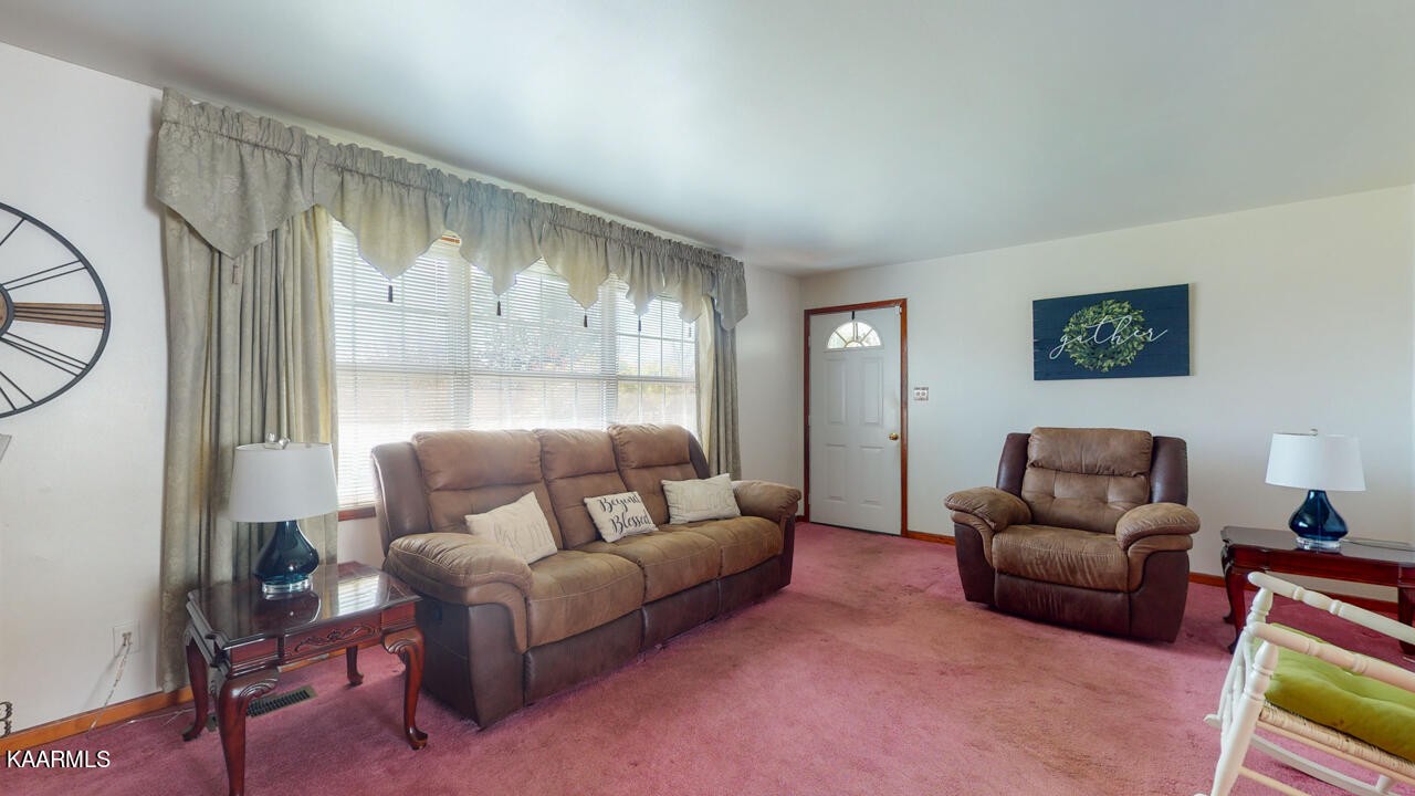 5409 Bluefield Road Knoxville, TN 37921 - Photo 11 of 33 a living room with furniture and a large window