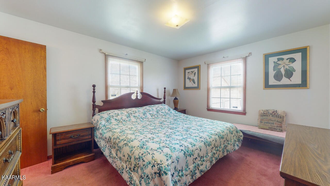 5409 Bluefield Road Knoxville, TN 37921 - Photo 18 of 33 a bedroom with a bed and a window