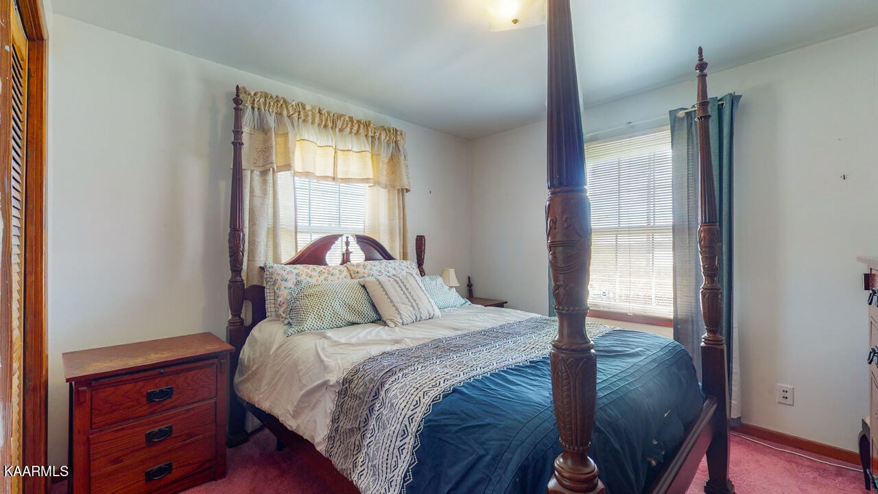 5409 Bluefield Road Knoxville, TN 37921 - Photo 22 of 33 a bedroom with a bed and a window