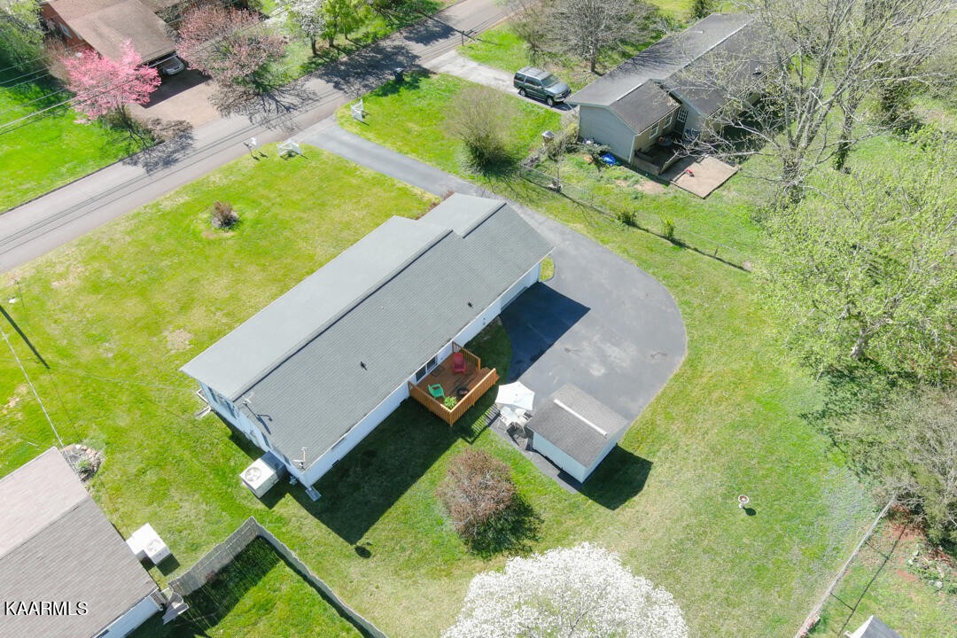 5409 Bluefield Road Knoxville, TN 37921 - Photo 31 of 33 an aerial view of a house with a garden and swimming pool