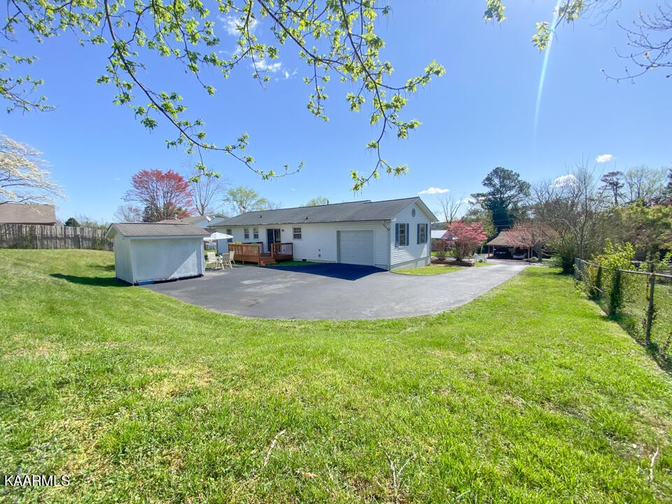 5409 Bluefield Road Knoxville, TN 37921 - Photo 33 of 33 a house with garden in front of it