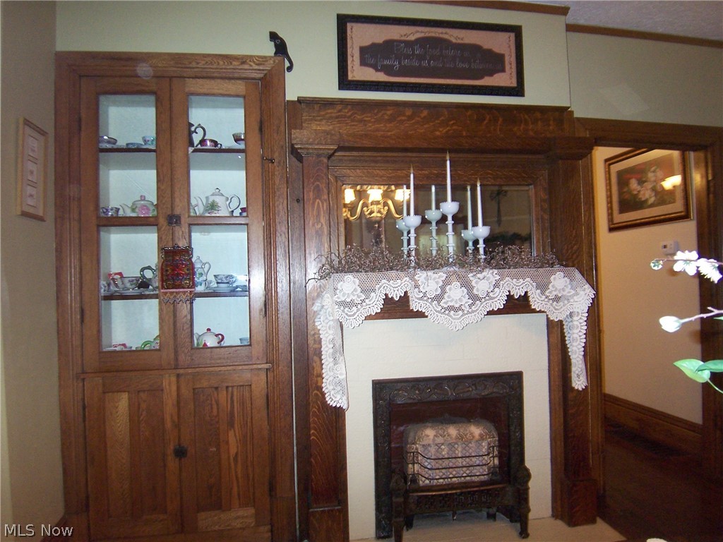 405 27th Street Vienna, WV 26105 - Photo 14 of 34 Original Built In Hutch & Fireplace