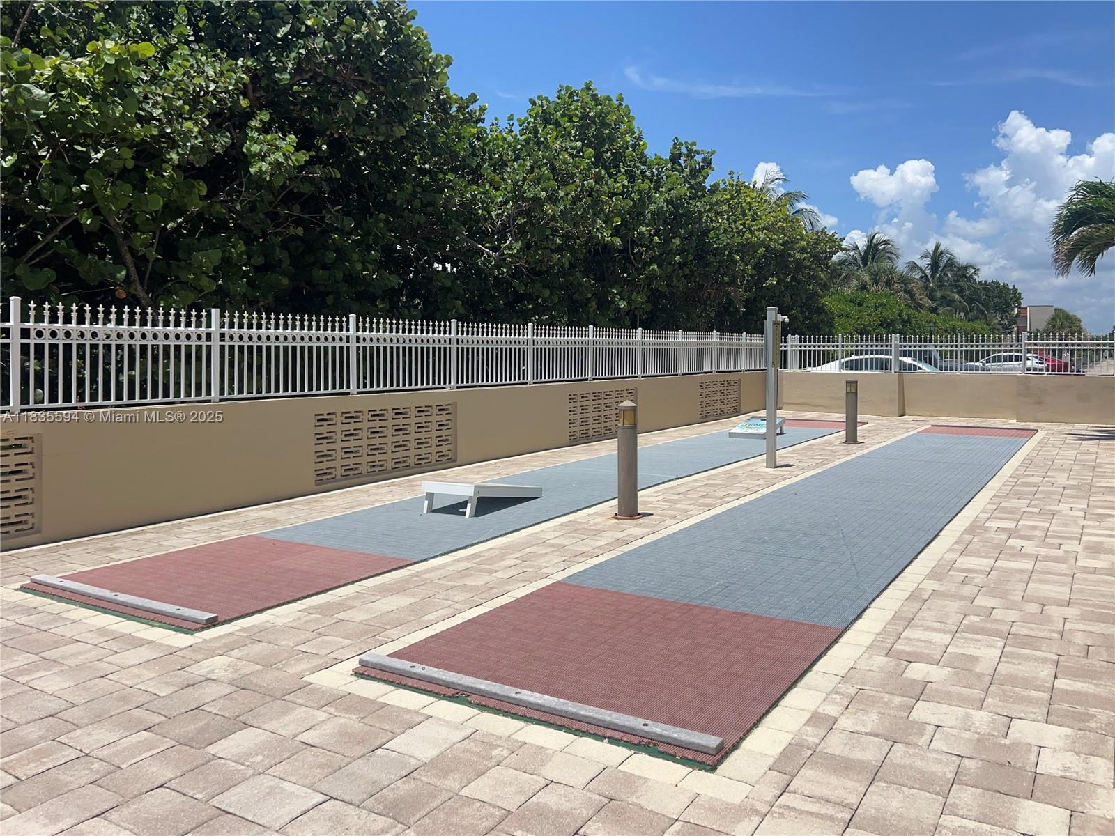 2000 South Ocean Boulevard, Unit 16P Lauderdale-by-the-Sea, FL 33062 - Photo 25 of 31 a view of a backyard