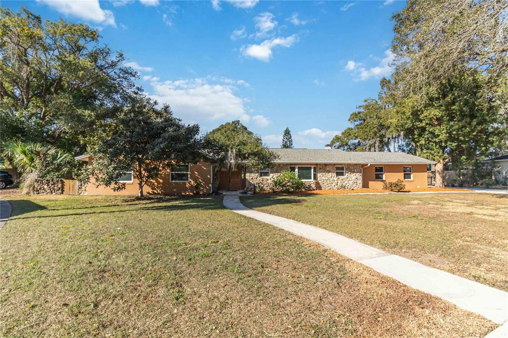 924 Wald Road Orlando, FL 32806 - Photo 2 of 66 a front view of a house with a yard