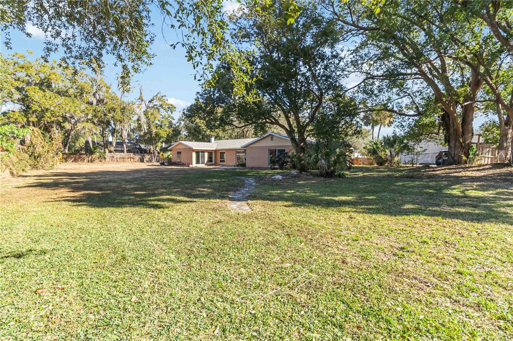 924 Wald Road Orlando, FL 32806 - Photo 46 of 66 a view of a yard with swimming pool
