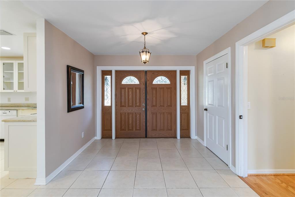 924 Wald Road Orlando, FL 32806 - Photo 8 of 66 wooden floor in a en suite bathroom next to a window