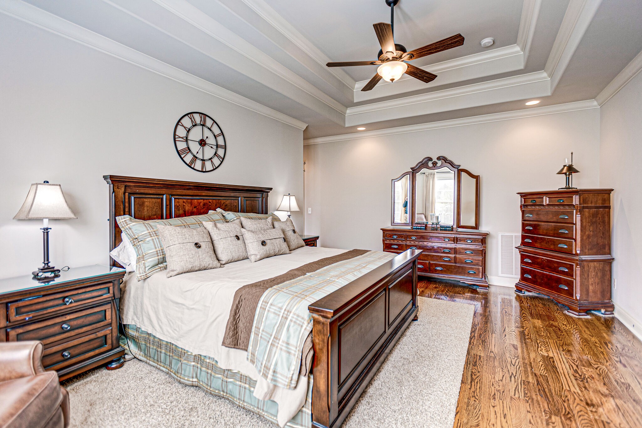 6005 Canberra Court Spring Hill, TN 37174 - Photo 23 of 55 a bedroom with a bed and a chandelier
