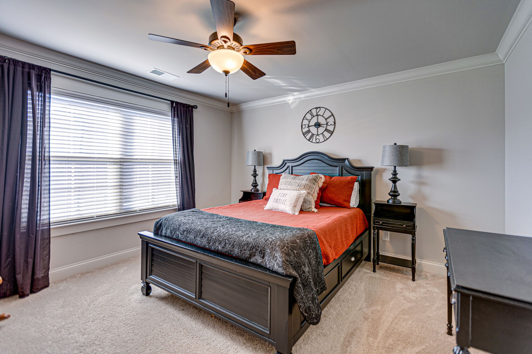 6005 Canberra Court Spring Hill, TN 37174 - Photo 34 of 55 a bedroom with a bed and a chandelier