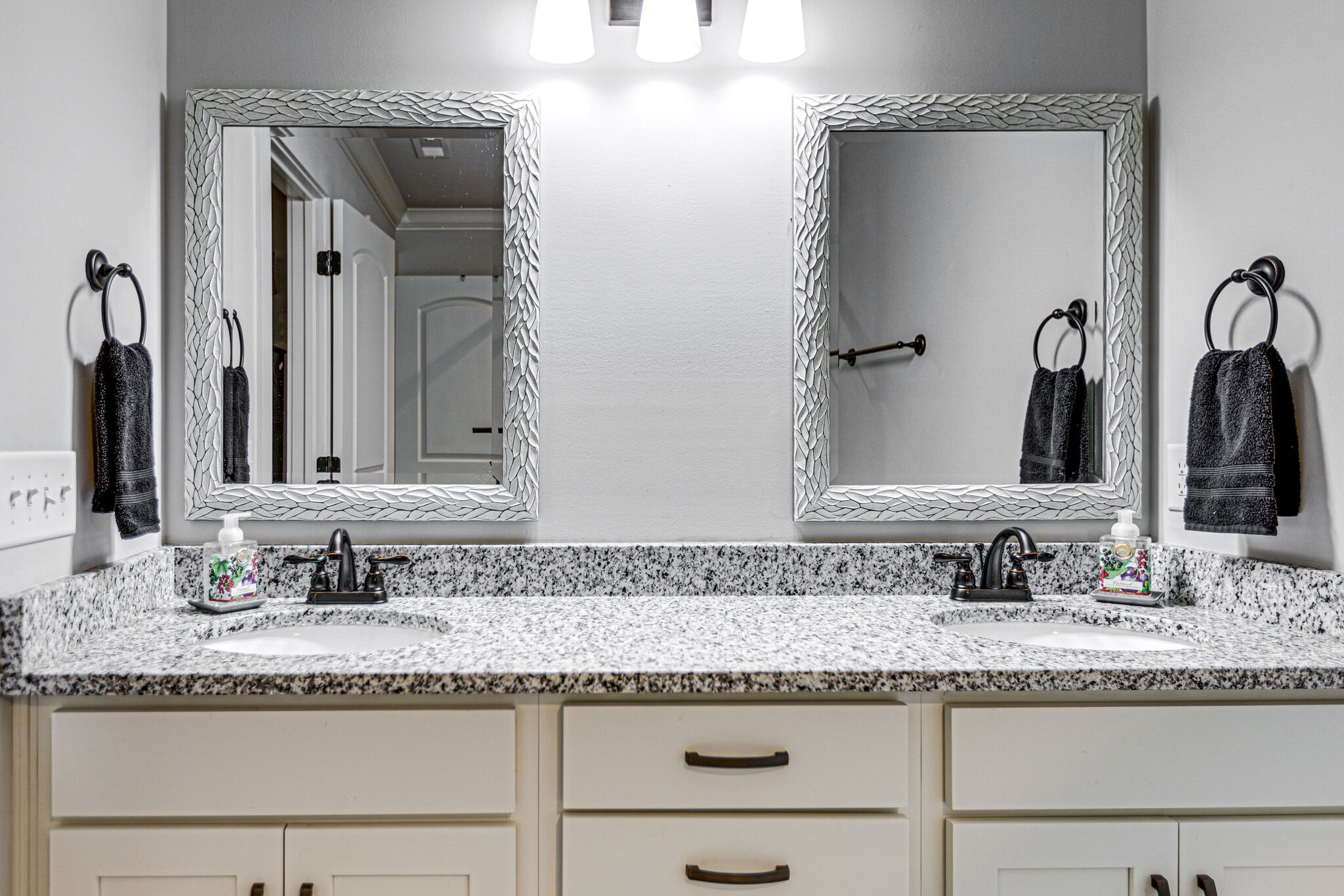 6005 Canberra Court Spring Hill, TN 37174 - Photo 36 of 55 a bathroom with a granite countertop sink and a mirror
