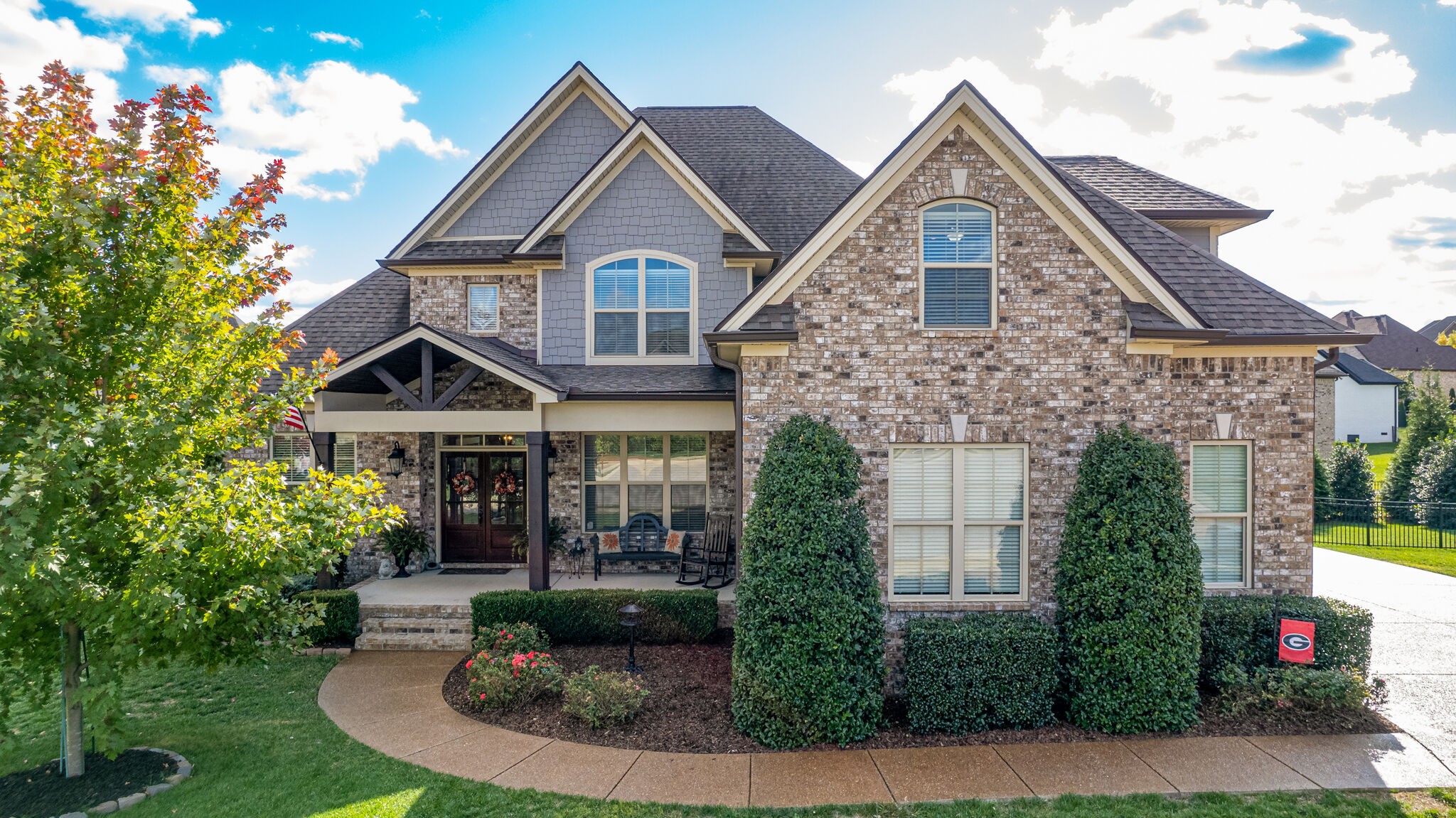 6005 Canberra Court Spring Hill, TN 37174 - Photo 44 of 55 a front view of a house with garden