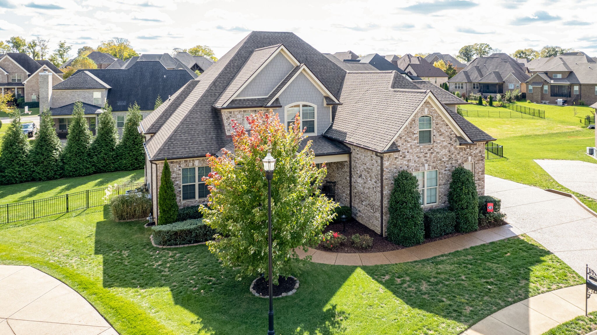 6005 Canberra Court Spring Hill, TN 37174 - Photo 46 of 55 a front view of a house with garden
