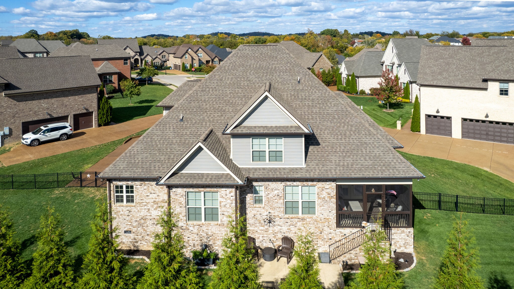 6005 Canberra Court Spring Hill, TN 37174 - Photo 51 of 55 an aerial view of a house with yard porch and furniture
