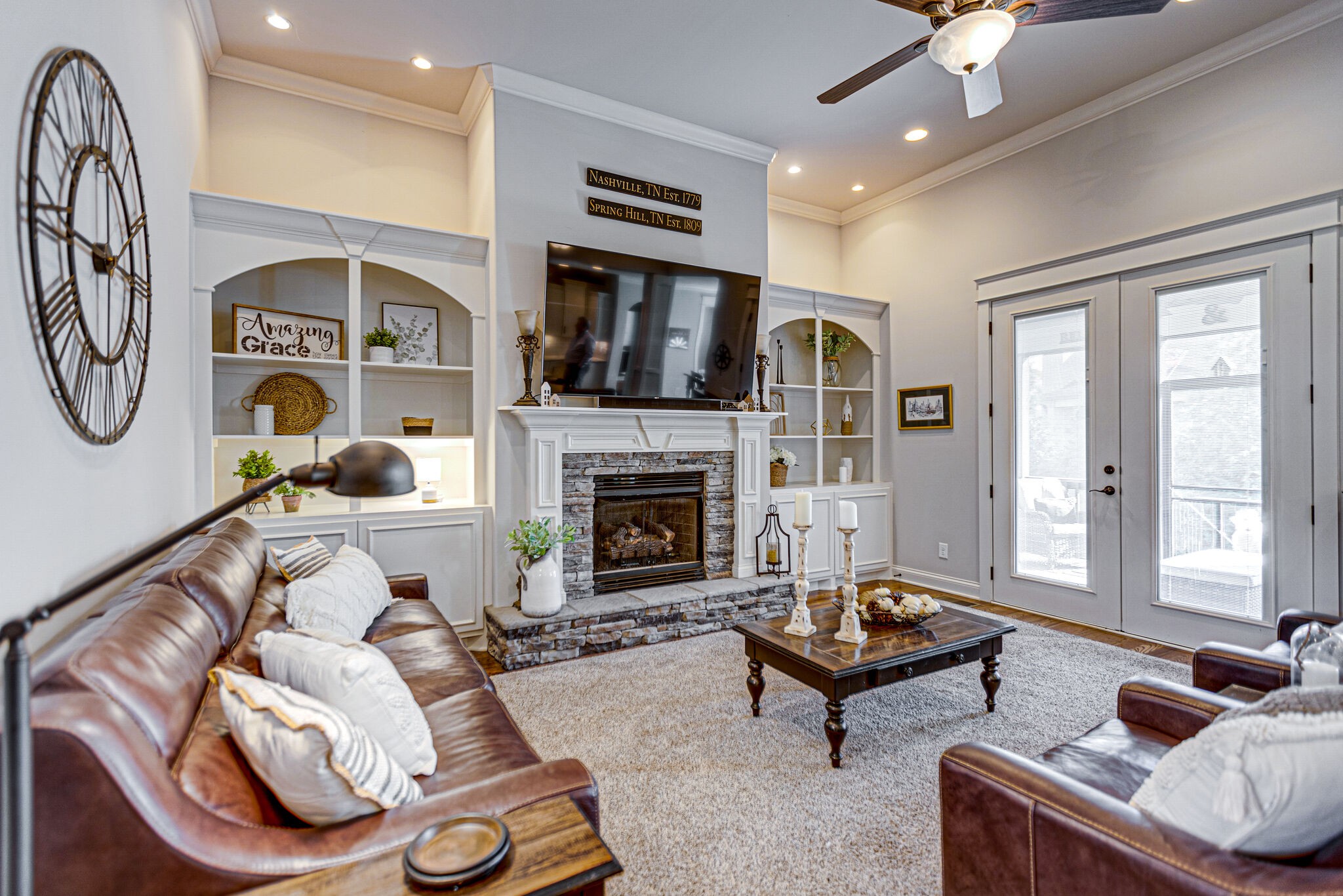 6005 Canberra Court Spring Hill, TN 37174 - Photo 6 of 55 a living room with furniture and a fireplace
