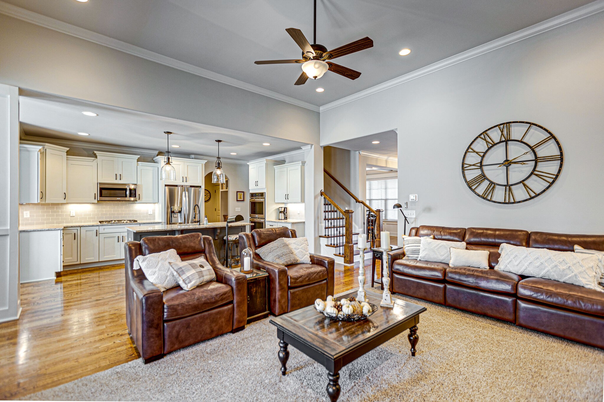 6005 Canberra Court Spring Hill, TN 37174 - Photo 8 of 55 a living room with furniture kitchen view and a potted plant