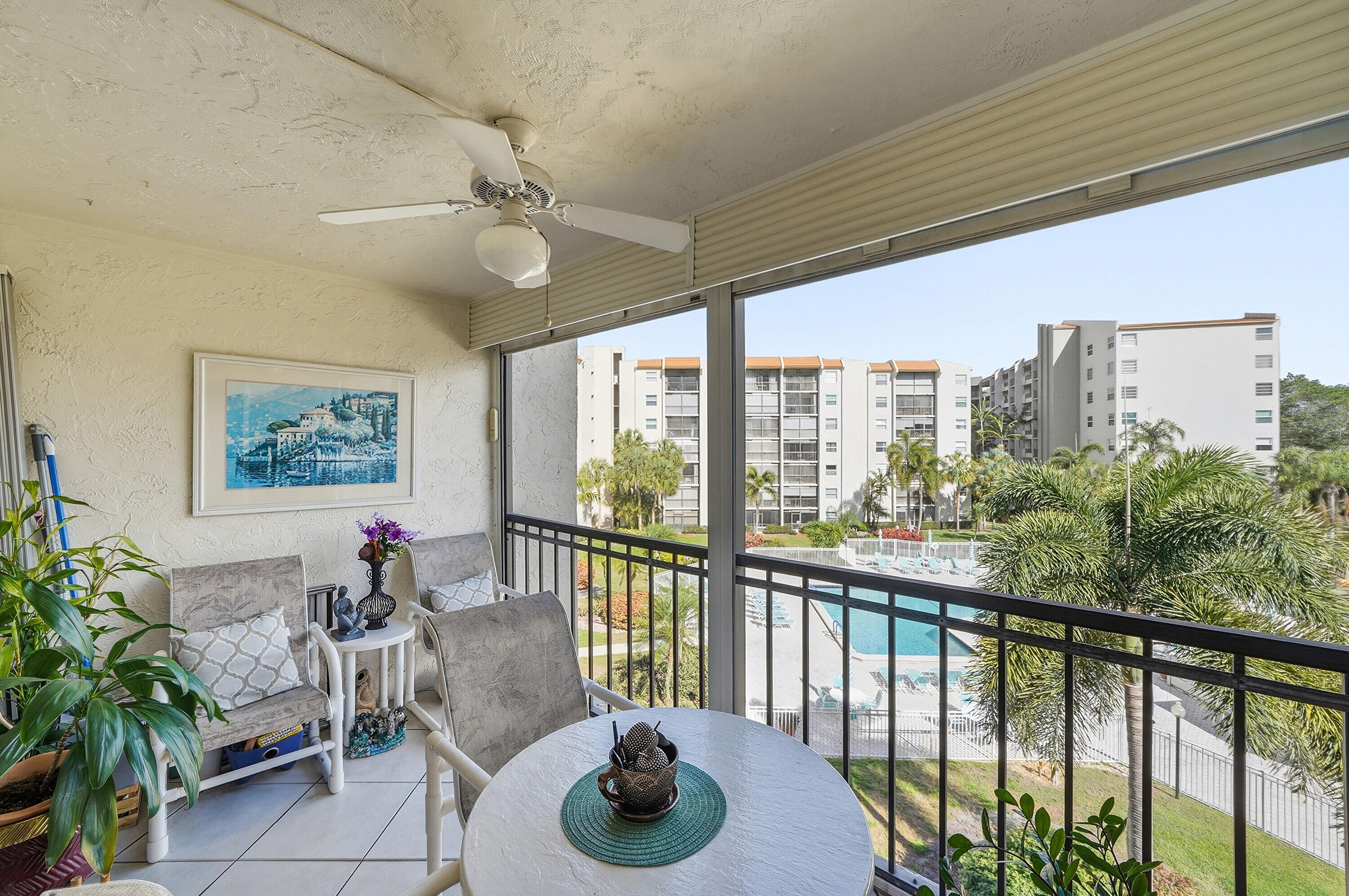 3920 Inverrary Boulevard, Unit 403C Lauderhill, FL 33319 - Photo 24 of 29 a living room with furniture and a large window