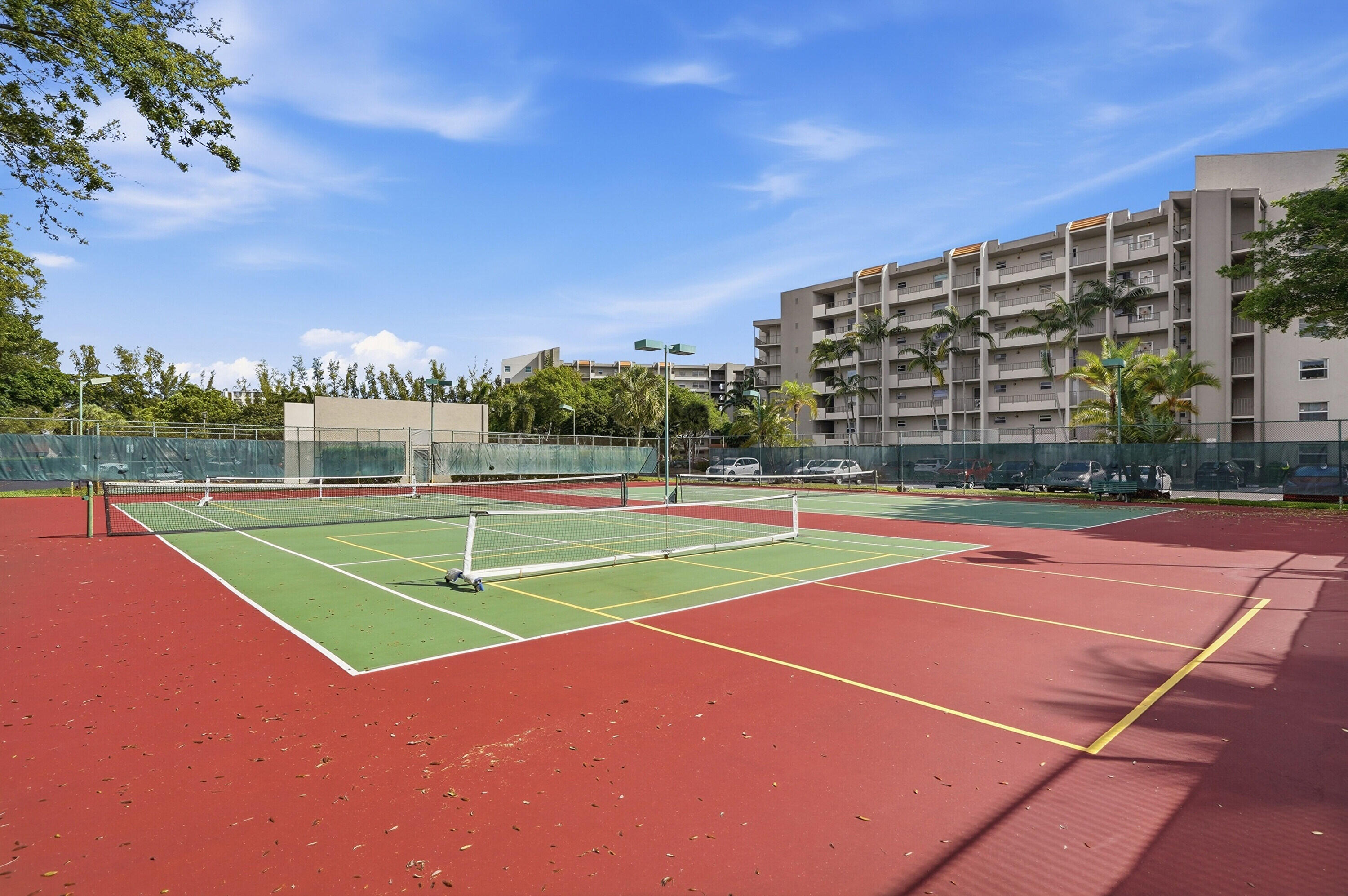 3920 Inverrary Boulevard, Unit 403C Lauderhill, FL 33319 - Photo 27 of 29 a view of an outdoor space and tennis court