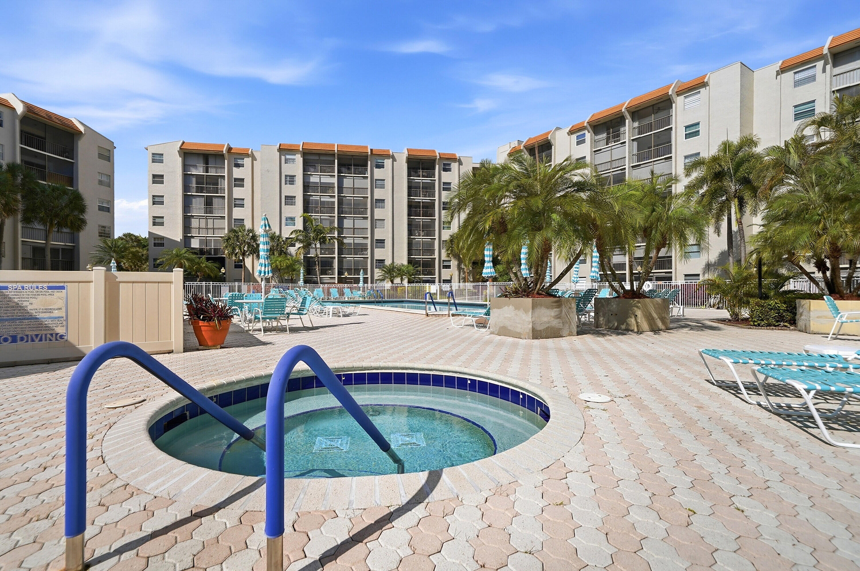 3920 Inverrary Boulevard, Unit 403C Lauderhill, FL 33319 - Photo 28 of 29 a view of outdoor space with swimming pool and furniture