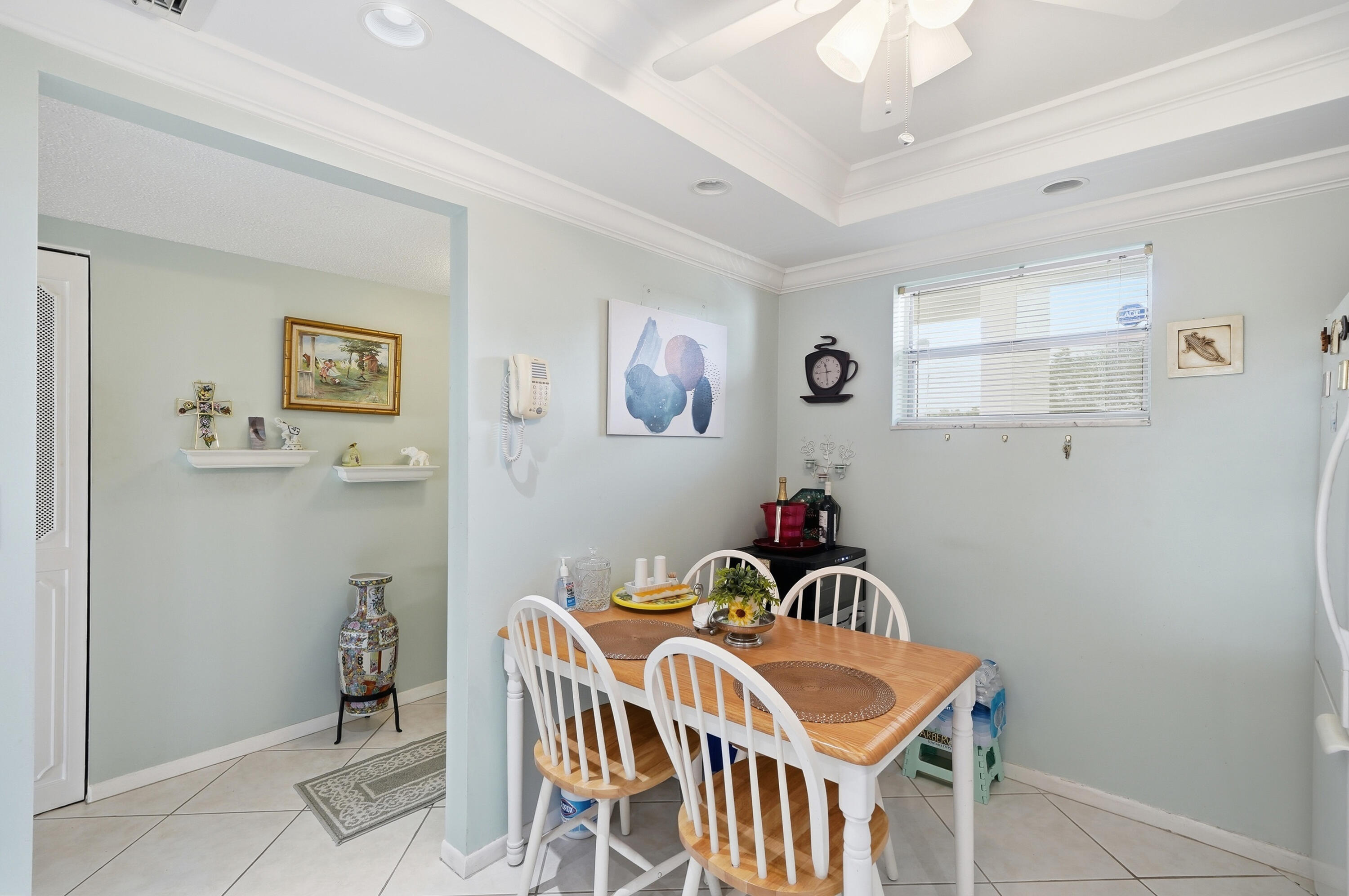 3920 Inverrary Boulevard, Unit 403C Lauderhill, FL 33319 - Photo 7 of 29 a view of a dining room with furniture and wooden floor