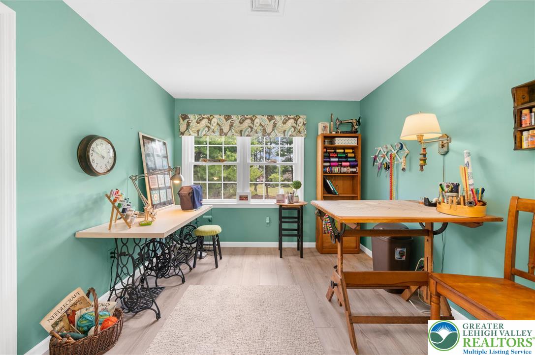 5616 Snowdrift Road Orefield, PA 18069 - Photo 21 of 36 A dedicated home office space with light-filled windows provides an inspiring environment for creative pursuits.