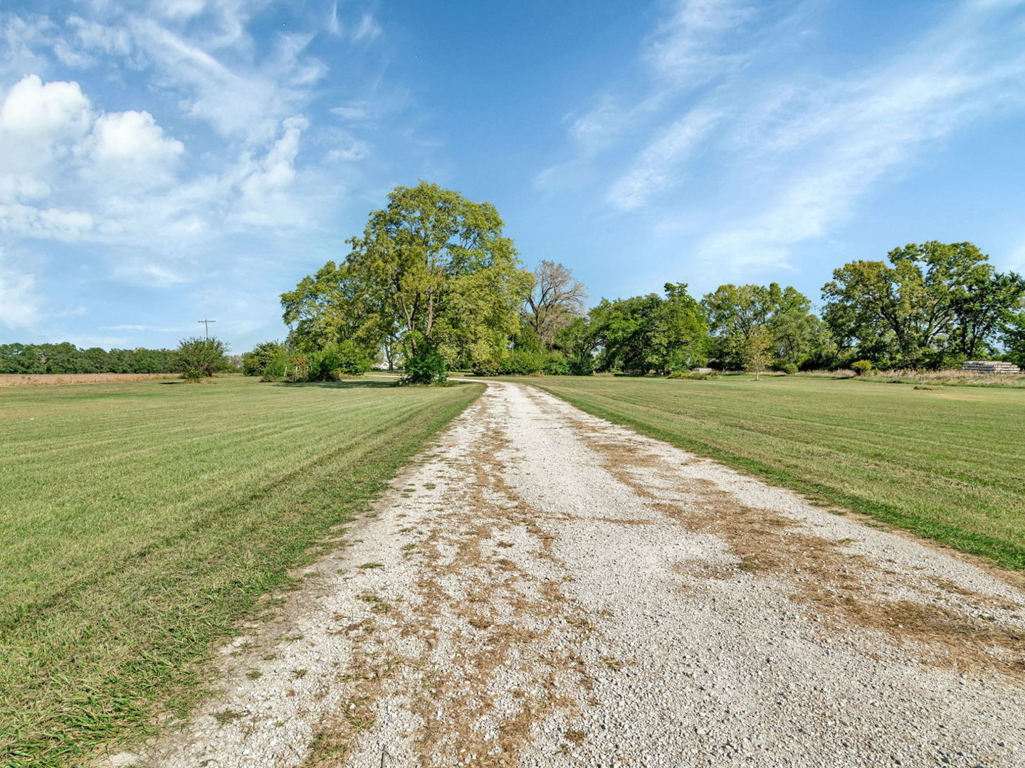 7140 East Huston Road Braceville, IL 60407 - Photo 29 of 34 a view of a lake with a big yard