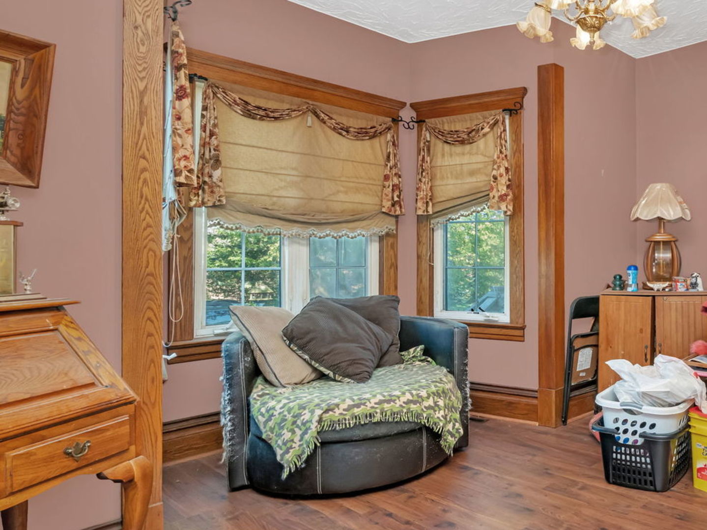 7140 East Huston Road Braceville, IL 60407 - Photo 7 of 34 a living room with furniture and a window