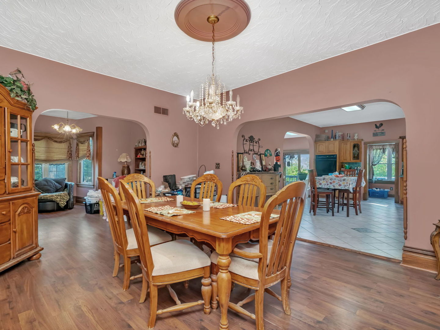 7140 East Huston Road Braceville, IL 60407 - Photo 9 of 34 a view of a dining room with furniture and wooden floor