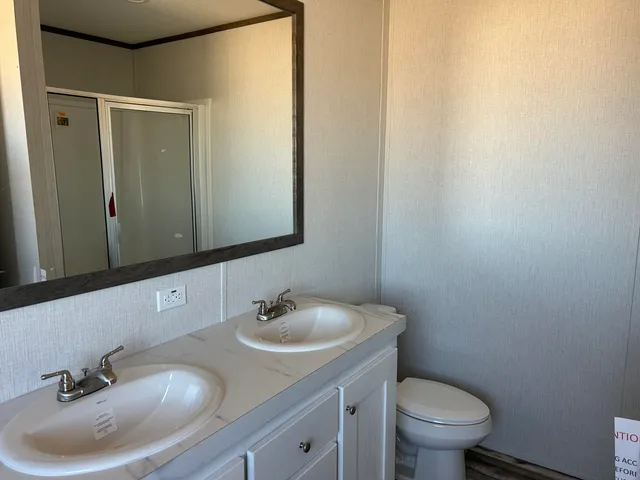a bathroom with a tub and a sink