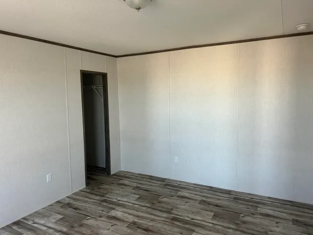 a white toilet sitting next to a bath tub