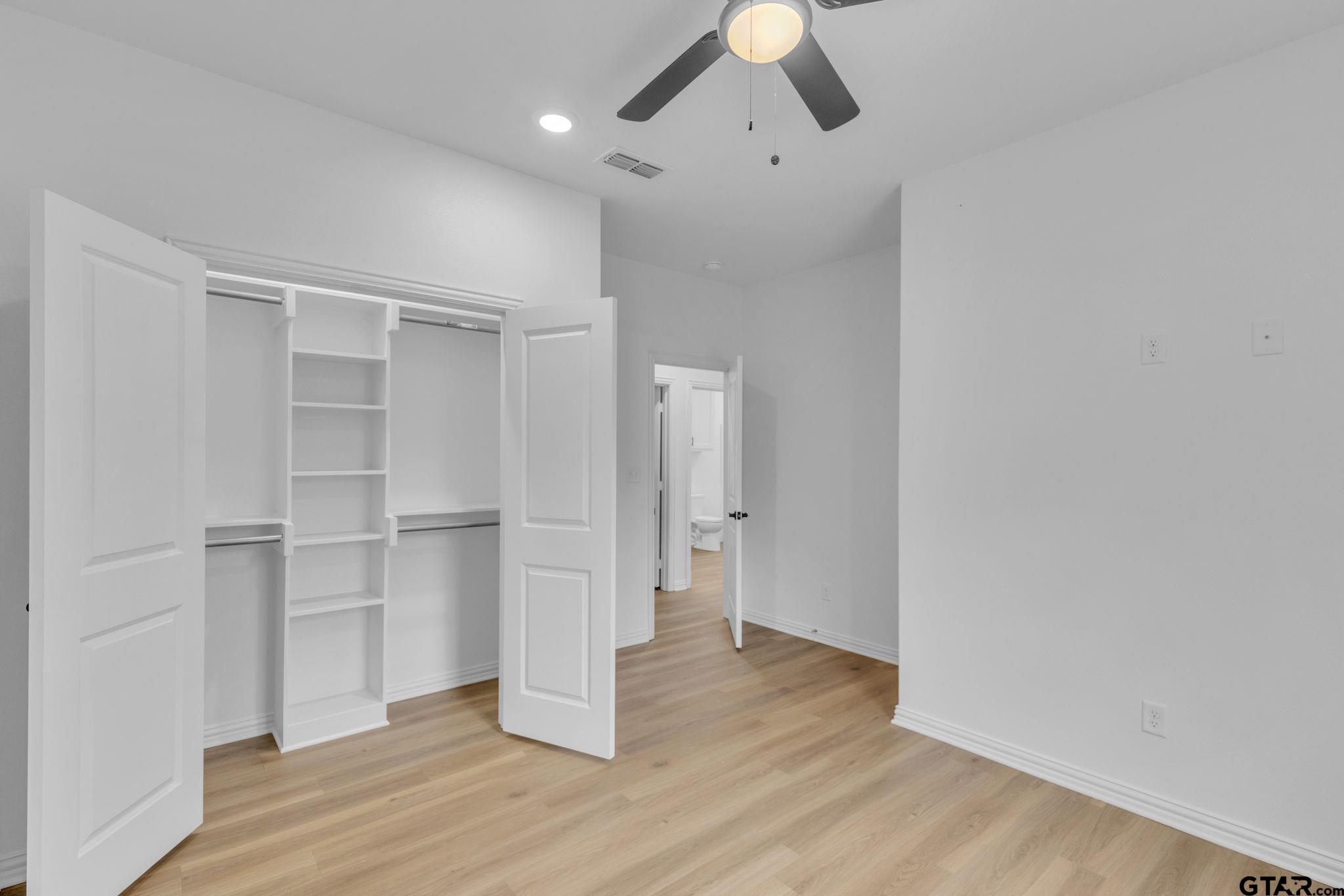 1410 West Connally Street Tyler, TX 75701 - Photo 16 of 29 a view of empty room with wooden floor