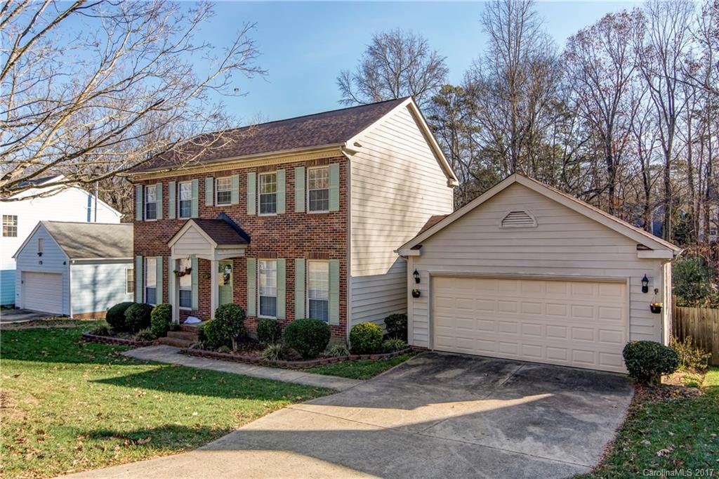 2206 Killarney Place Charlotte, NC 28262 - Photo 2 of 23 a front view of a house with garden