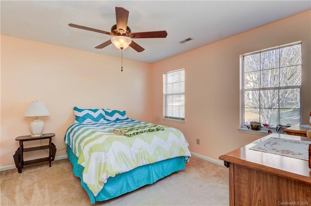 2206 Killarney Place Charlotte, NC 28262 - Photo 18 of 23 a bedroom with a bed and window