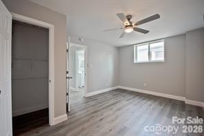 1404 Nottingham Road Kannapolis, NC 28081 - Photo 13 of 30 a view of an empty room with wooden floor