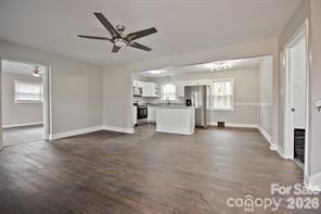 1404 Nottingham Road Kannapolis, NC 28081 - Photo 14 of 30 a view of a livingroom with a ceiling fan and window