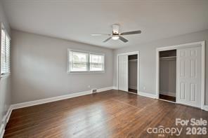 1404 Nottingham Road Kannapolis, NC 28081 - Photo 19 of 30 a view of an empty room with a window and wooden floor