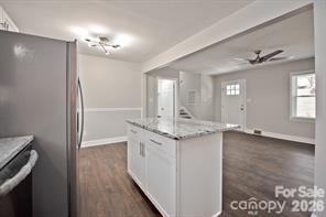 1404 Nottingham Road Kannapolis, NC 28081 - Photo 9 of 30 a view of a kitchen from a hallway