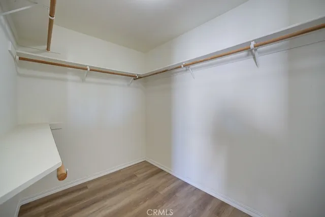 a view of an empty walk in closet