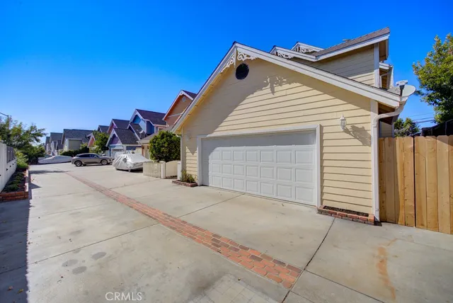a view of a house with a yard and garage
