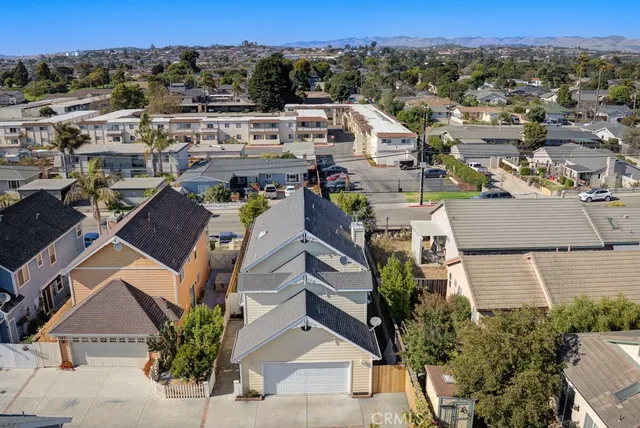 an aerial view of a house with a garden