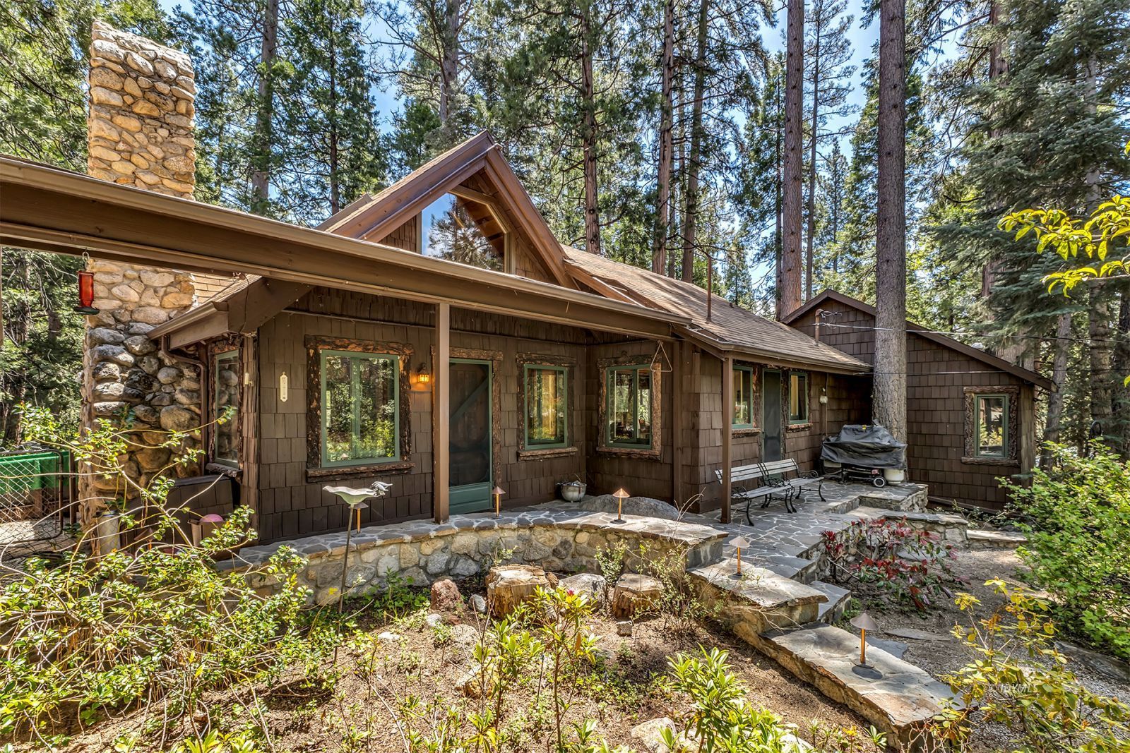 25100 Indian Rock Road Idyllwild, CA 92549 - Photo 3 of 75 a view of a house with yard and sitting area