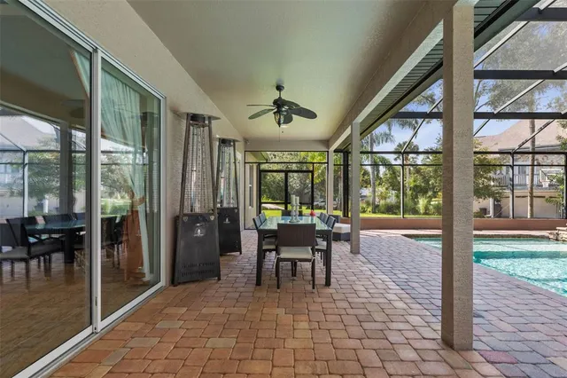 a view of a swimming pool with a bench