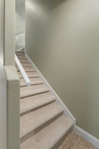 an aerial view of a city and lake view