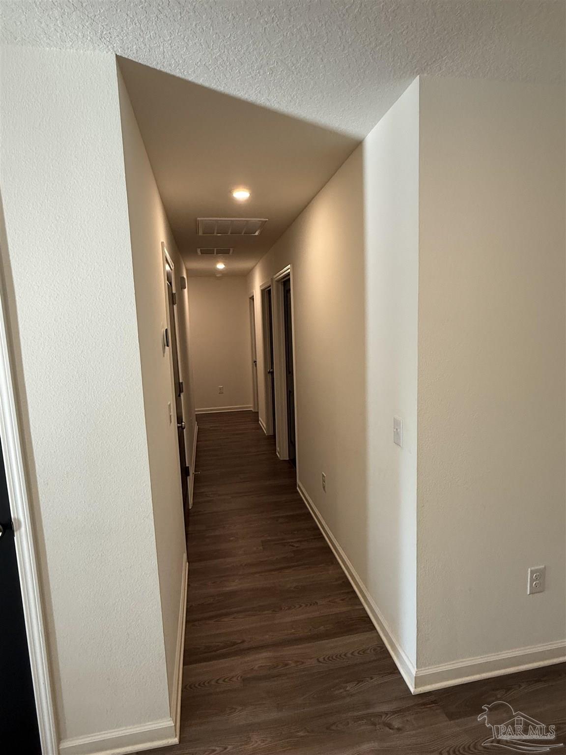 9279 3 Hollow Road Jay, FL 32565 - Photo 11 of 42 a view of hallway with wooden floor