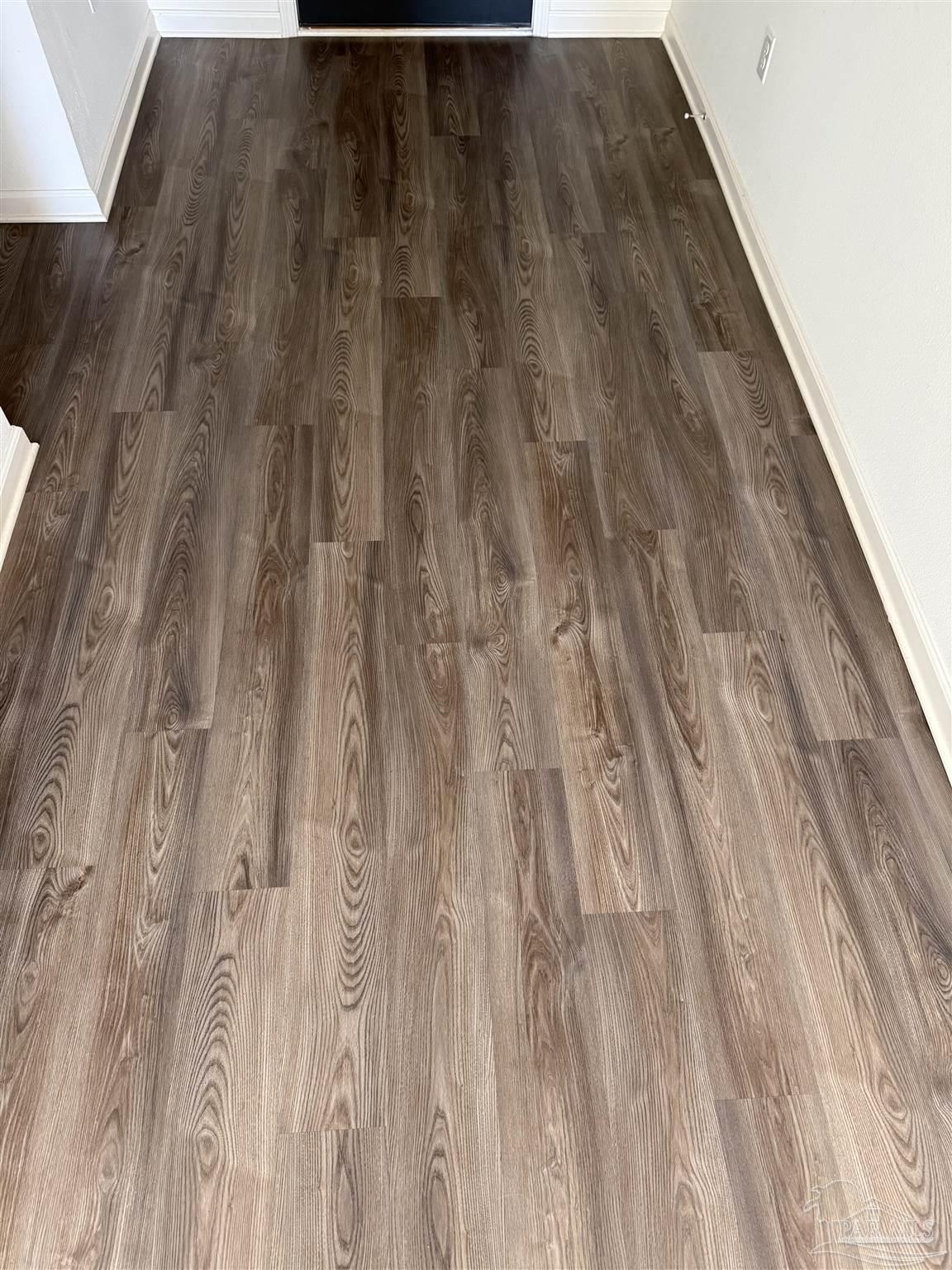 9279 3 Hollow Road Jay, FL 32565 - Photo 16 of 42 a close view of wooden floor