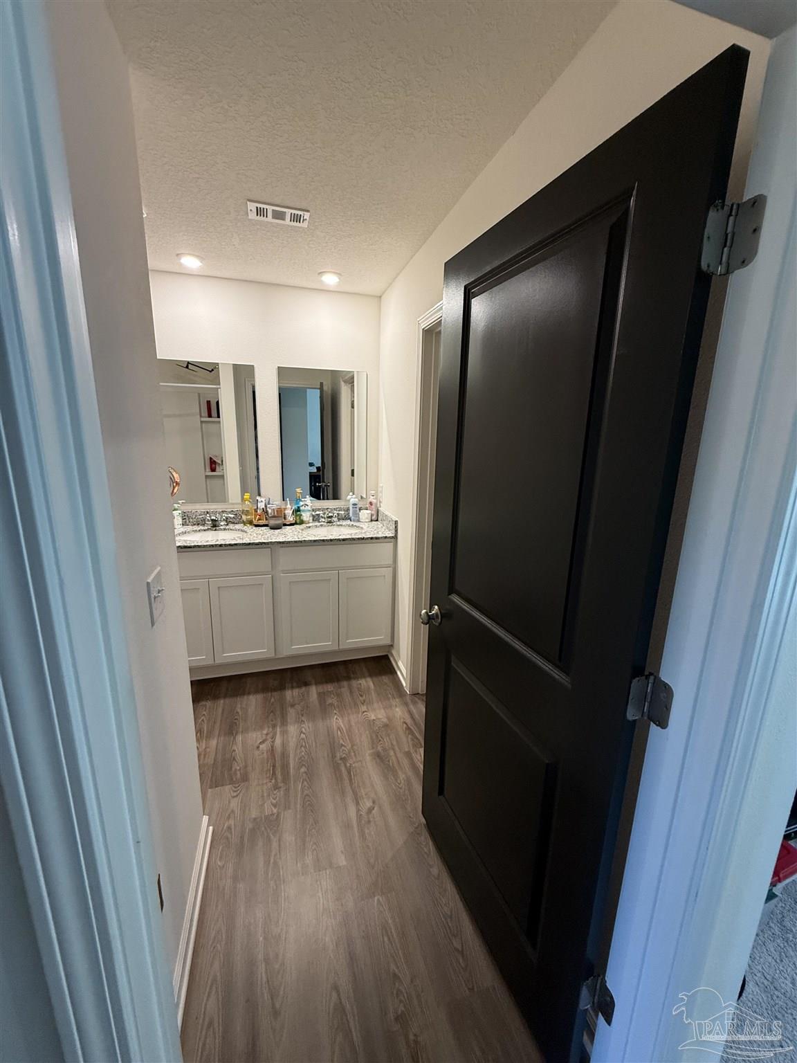9279 3 Hollow Road Jay, FL 32565 - Photo 28 of 42 a kitchen with stainless steel appliances a refrigerator and a sink