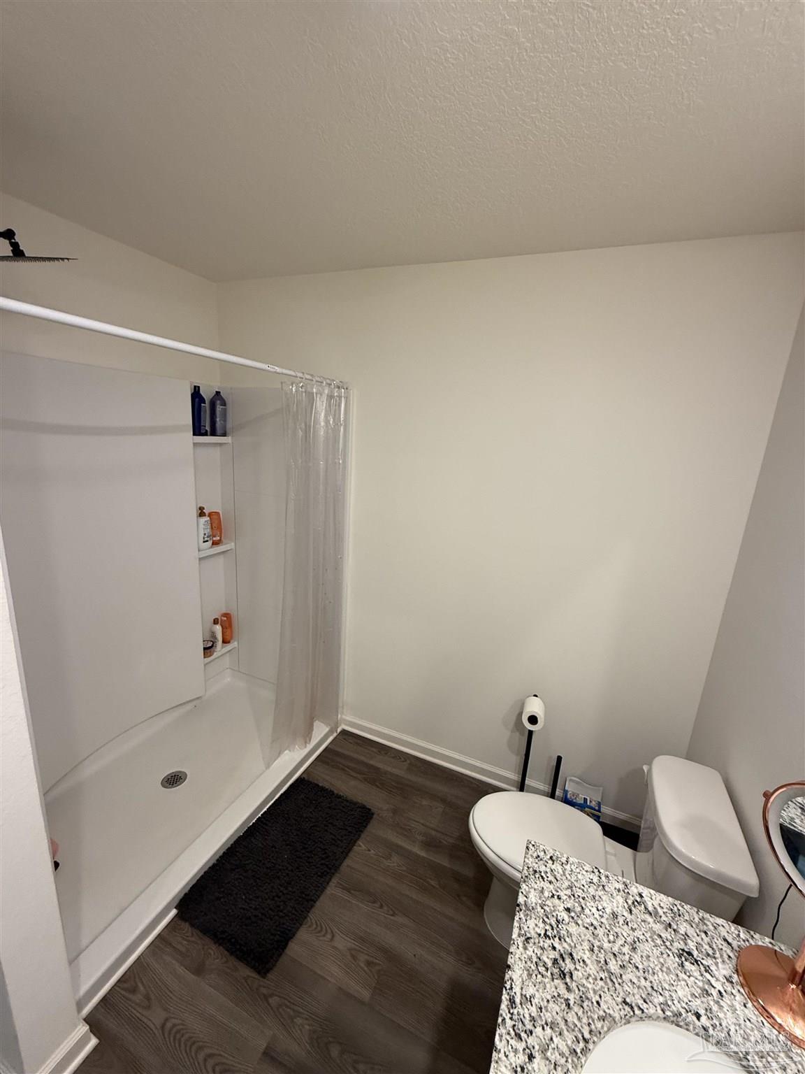 9279 3 Hollow Road Jay, FL 32565 - Photo 29 of 42 a bathroom with a sink and a mirror